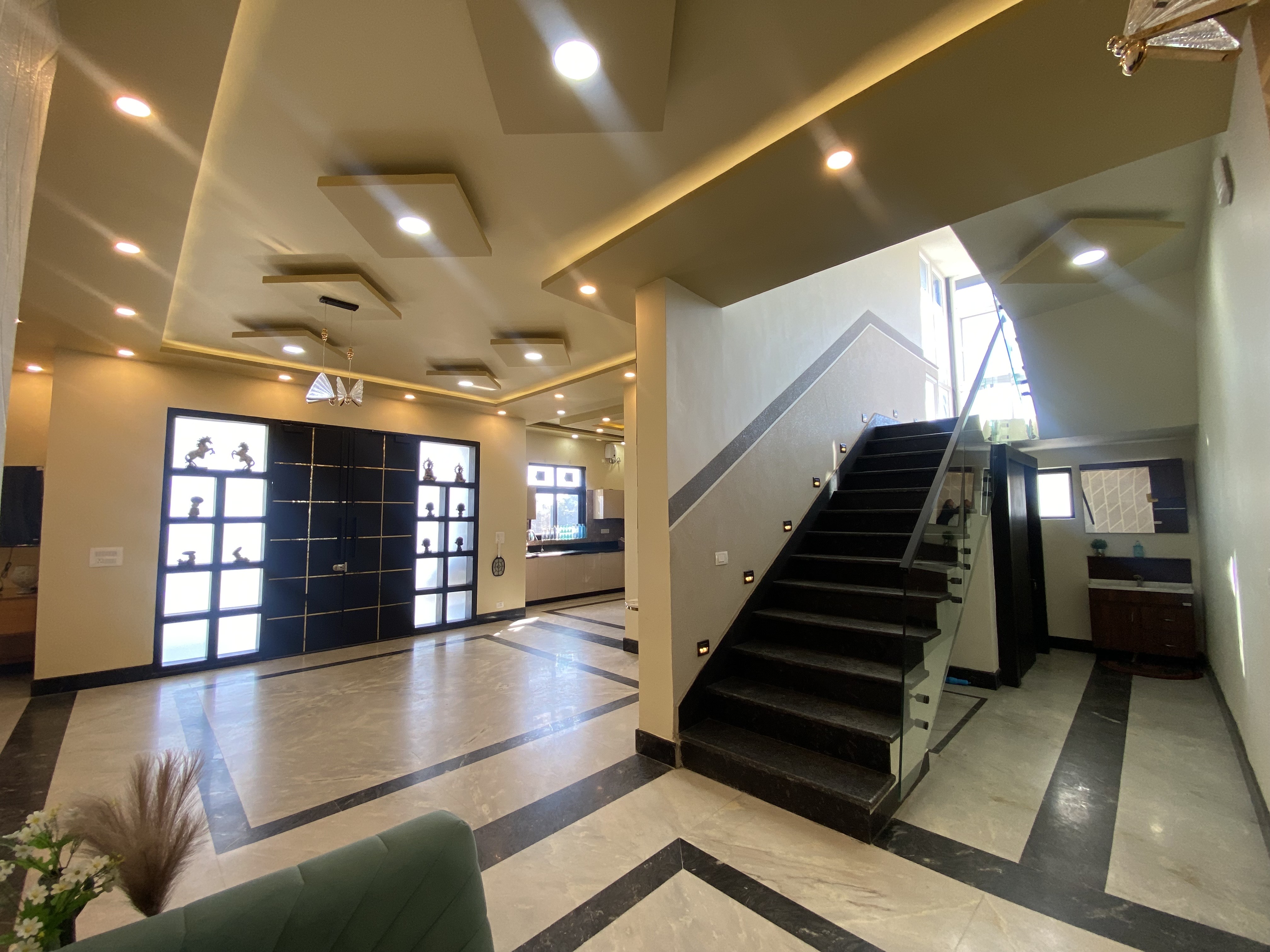 Hall chandelier and designer ceiling